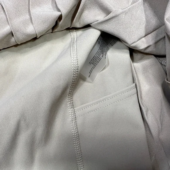 Aritizia TnAction TnaMove Tennis ProMicro pleated high rise Skirt Tan Size L - Picture 8 of 10